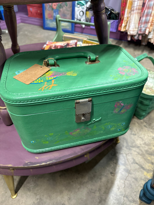 Green make-up suitcase